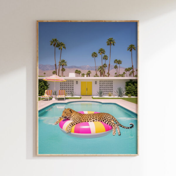 Leopard resting on a striped pool float in Palm Springs wall art print