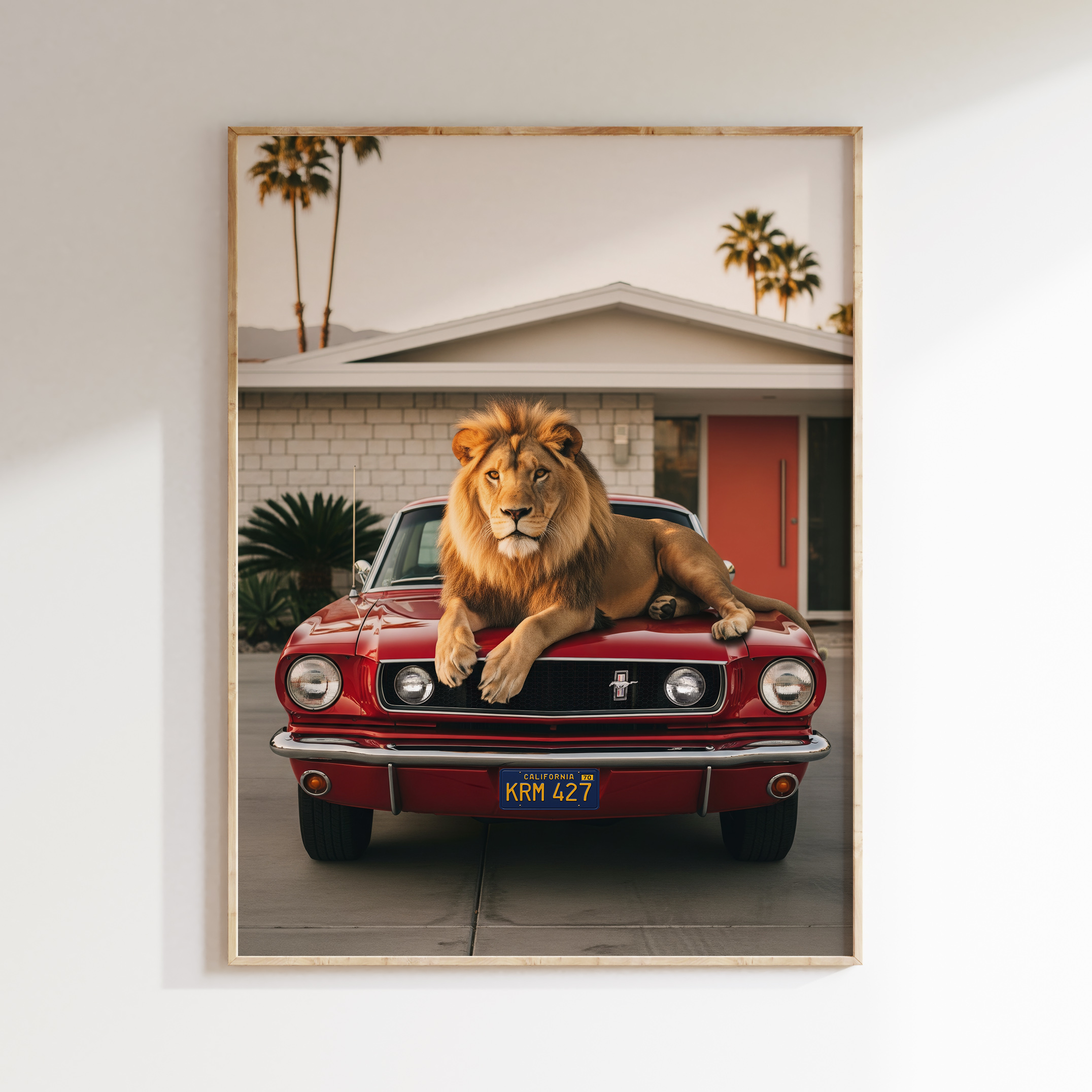 Framed Palm Springs lion wall art with red Mustang in retro-modern style.