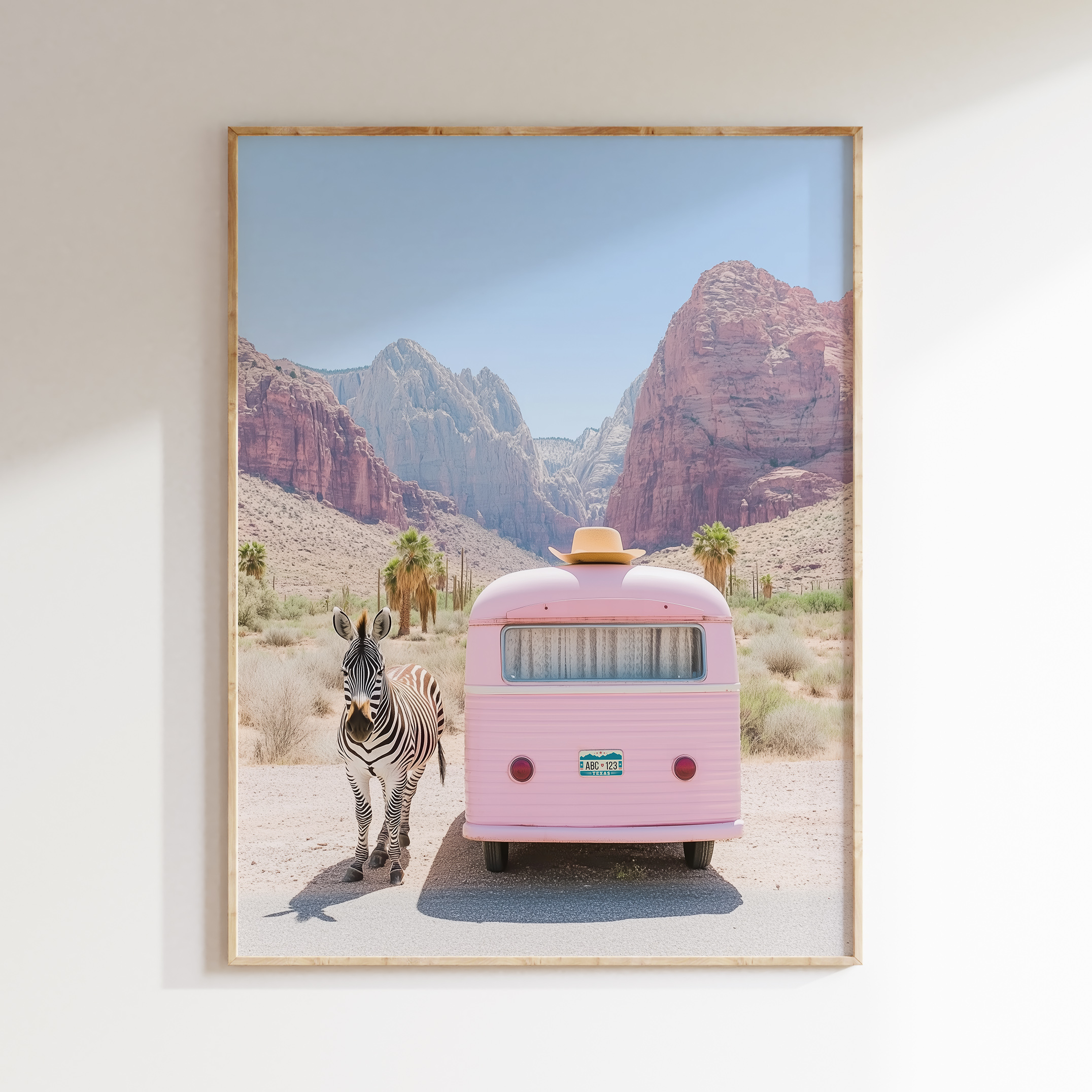 Zebra pink trailer wall art artwork view 1 with a zebra subject paired with a pink trailer in a crisp retro-desert composition
