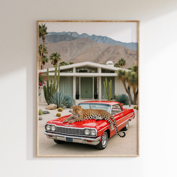 Framed leopard desert wall art with red classic car in Palm Springs-inspired style.