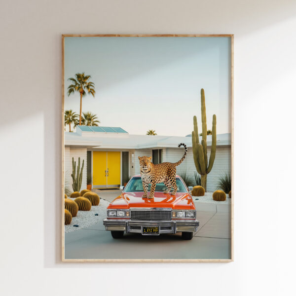 Framed leopard car wall art with yellow door in Palm Springs-inspired style.
