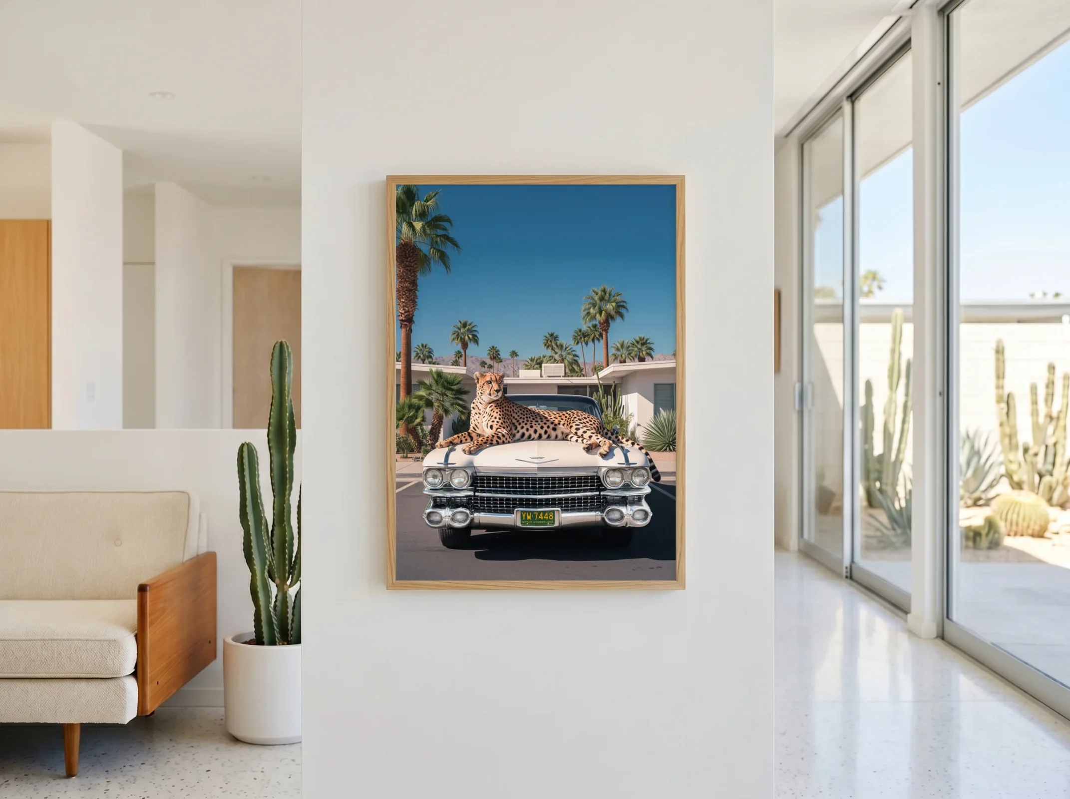 Cheetah wall art with a white Cadillac styled as a premium housewarming gift in a Palm Springs-inspired interior