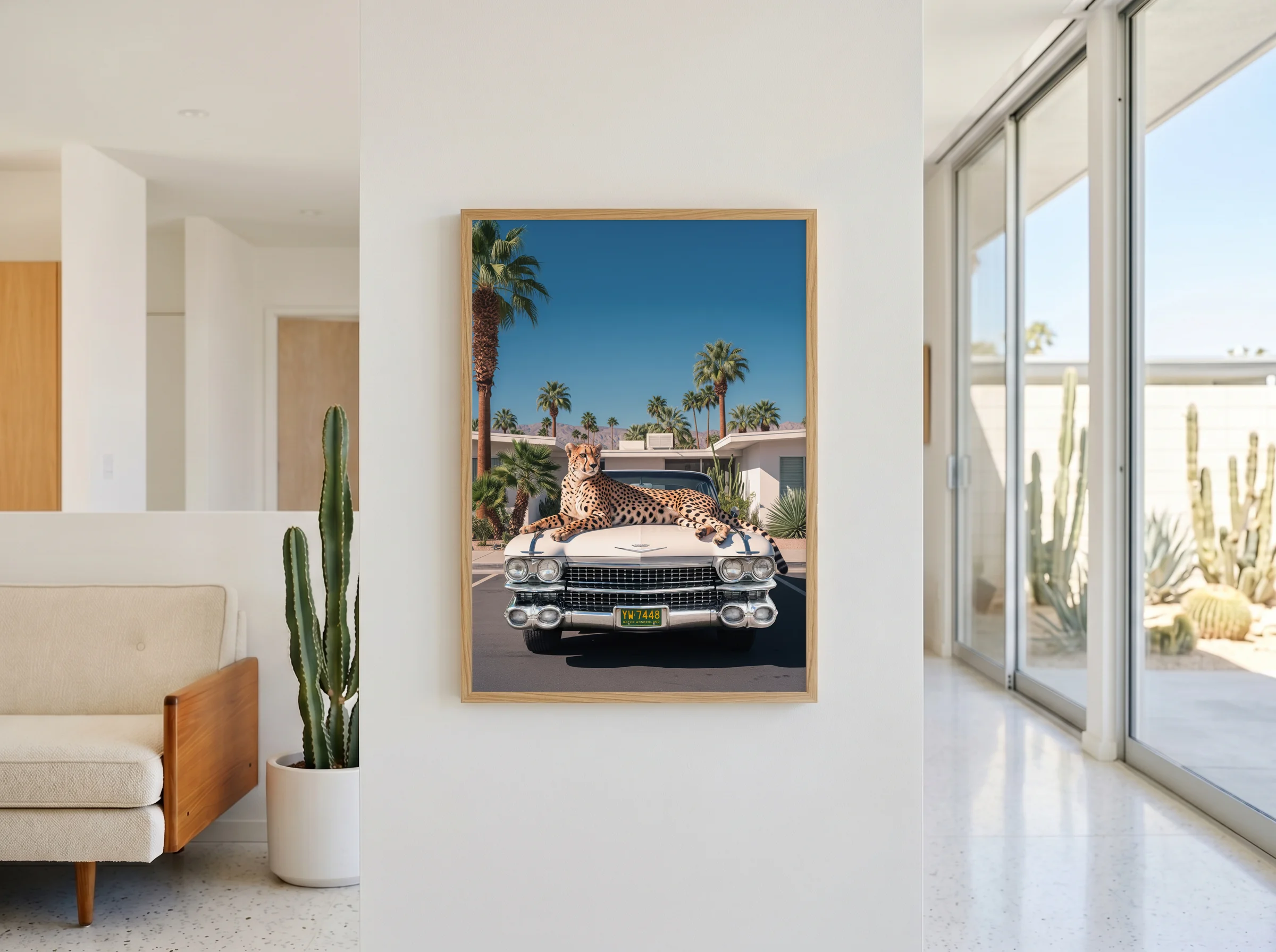 Cheetah wall art with a white Cadillac styled as a premium housewarming gift in a Palm Springs-inspired interior