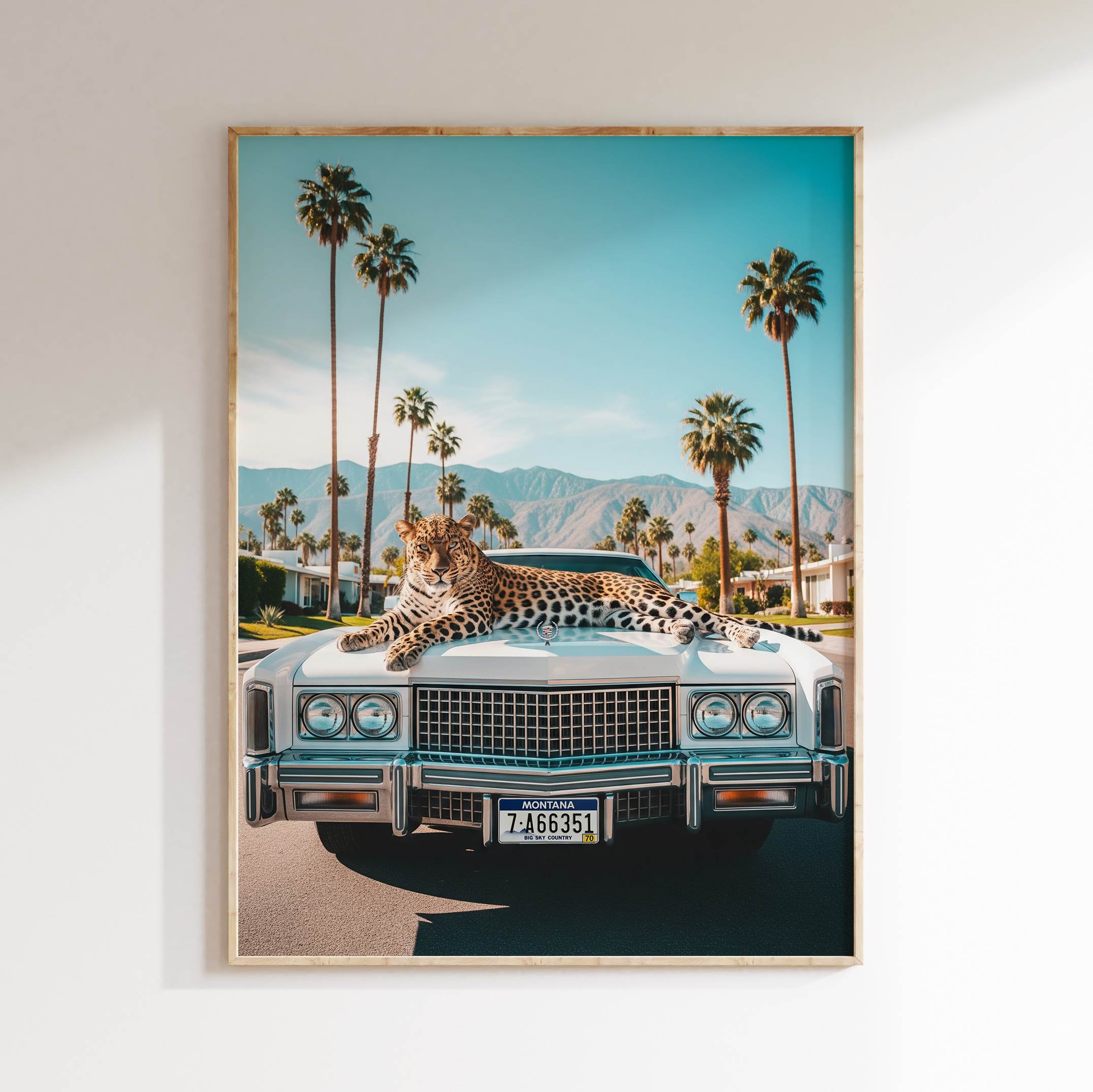Framed leopard classic Cadillac wall art print in Palm Springs-inspired style.