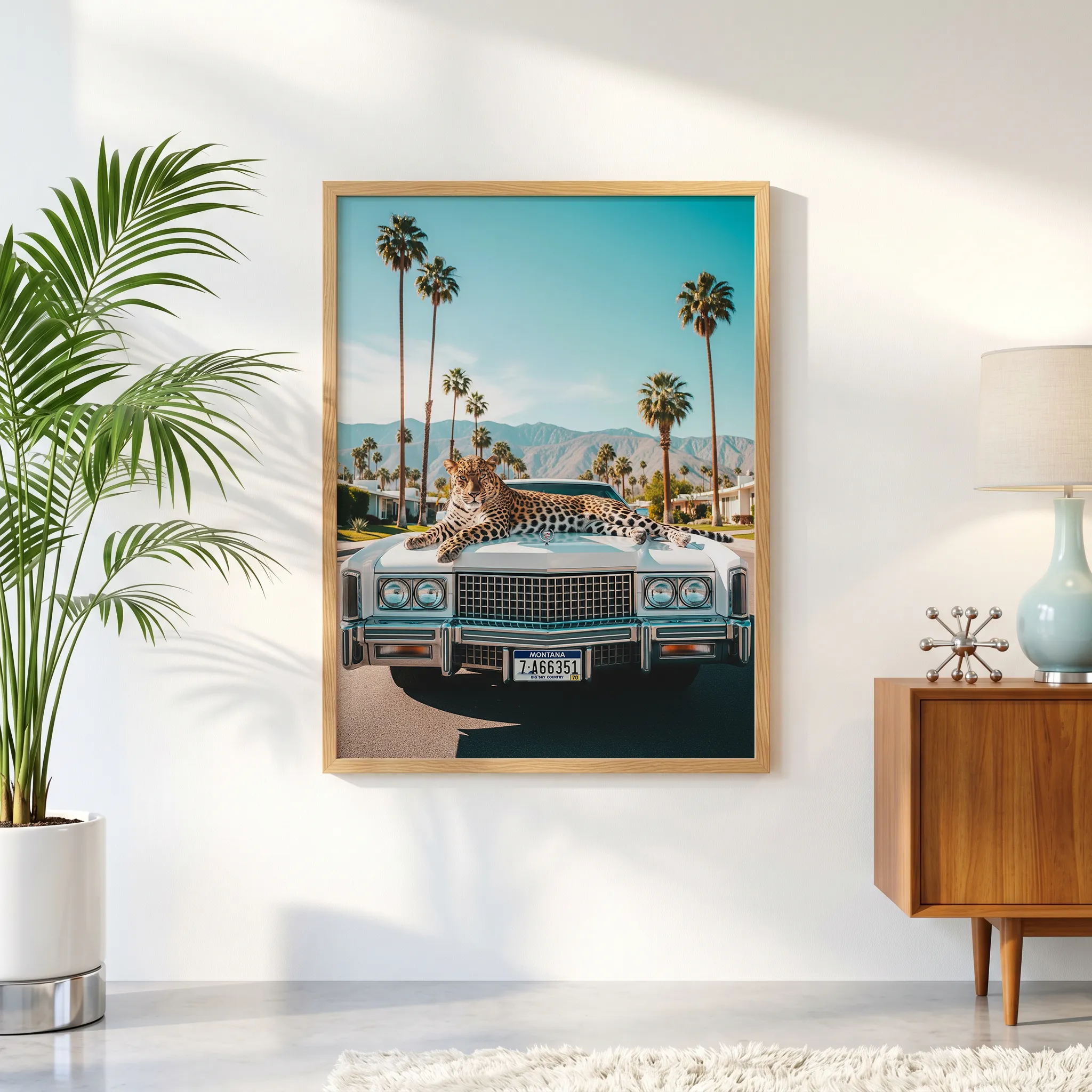 Palm Springs-inspired framed print featuring leopard with classic Cadillac.
