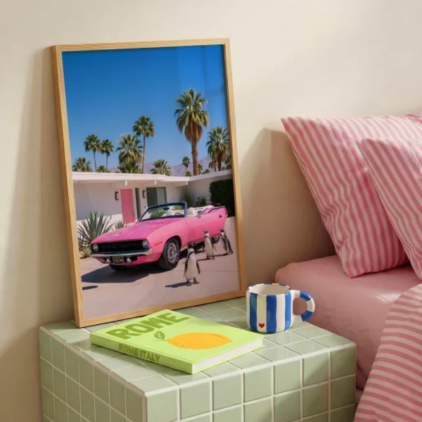Penguin pink convertible wall art artwork view 2 with a duo penguin composition with a pink convertible and relaxed roadside atmosphere