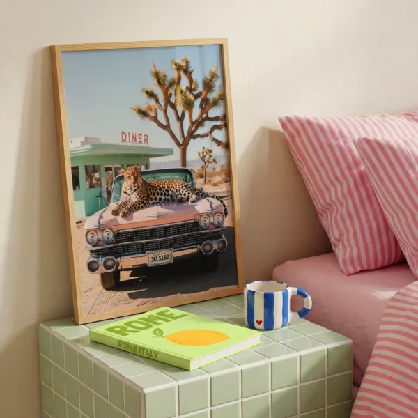 Framed leopard car art print with pink diner color palette