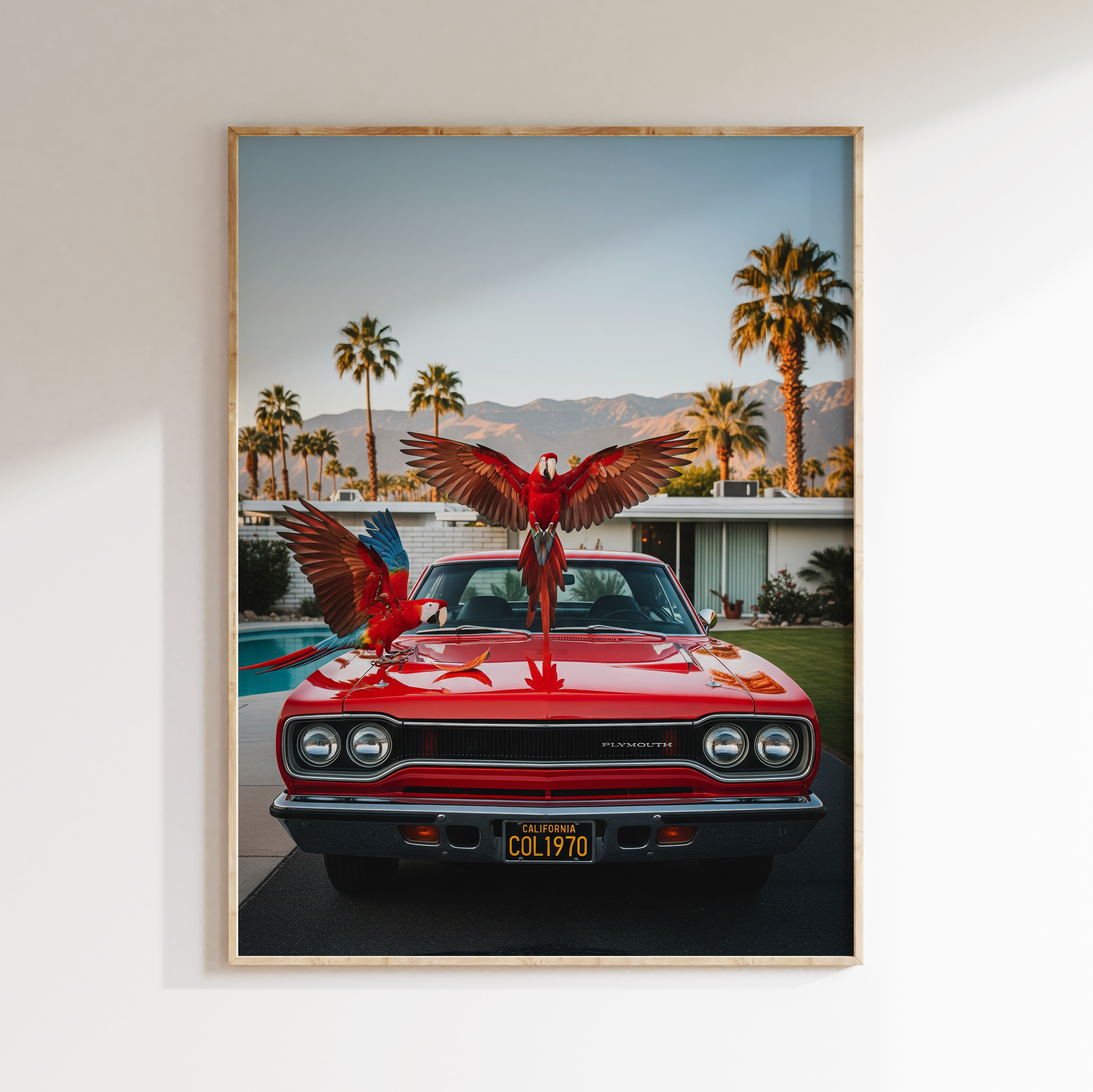 Framed parrot car wall art with red Plymouth in Palm Springs-inspired style.