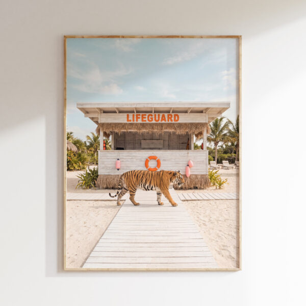Tiger at a lifeguard stand on a sandy beach boardwalk wall art