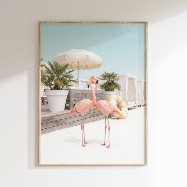 Framed Flamingo Cabana Club art print with two pink flamingos at a bright beach resort