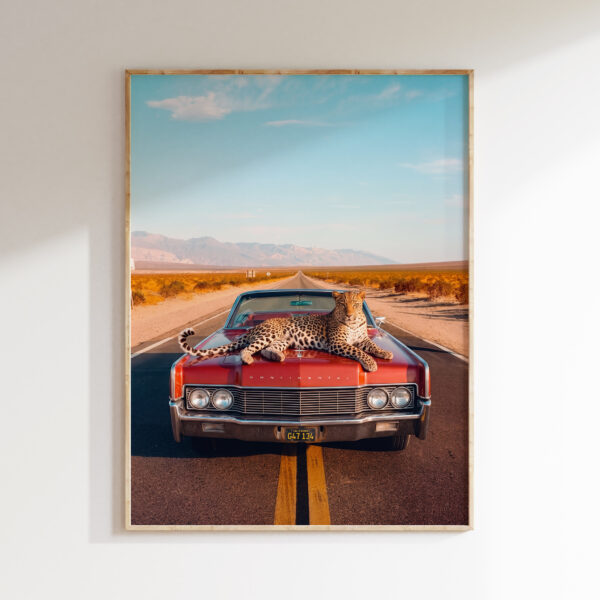 Framed Leopard on the Open Road art print with a leopard on a red classic convertible along a desert highway