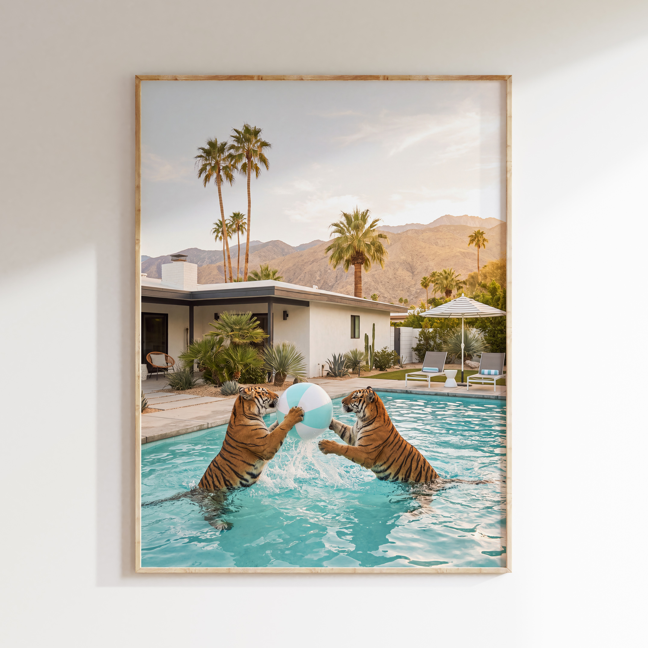 Two tigers beach ball wall art with blue and white ball in a turquoise pool