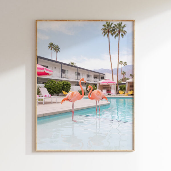 Flamingo poster in a natural wood frame showing two pink flamingos at a turquoise Palm Springs motel pool